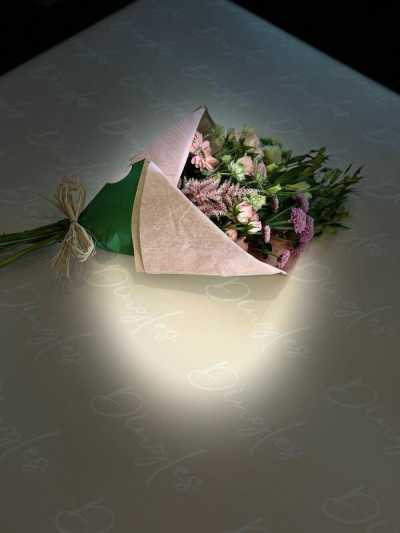 Raspberry Crush - A beautiful collection of flowers simply wrapped and ready to arrange.