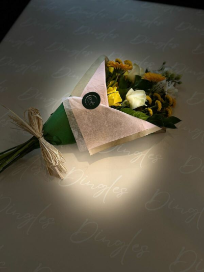 Lemon & Lime - A beautiful collection of flowers simply wrapped and ready to arrange.
