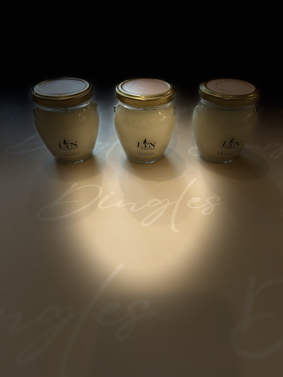 Local Peony Scented Candle - Add an exclusive local scented candle from the famous Lyn Candles of Lynton. This local Lyn candle is in a glass jar and has a burn time of 35 - 40 hours. We gift wrap each candle in recycled tissue paper, ribbon and place in a branded Dingles kraft bag.
