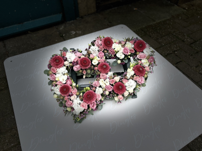 Deluxe Double Heart - Two beautiful hearts with an open design, each features fresh flowers of choice, nestled in fresh foliage.