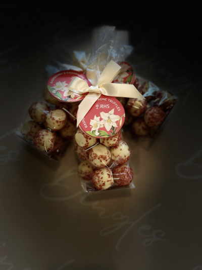 RHS Raspberry & Champagne Truffles - Why not add these to your beautiful floral arrangement? Where by a Dingles Expert will place these on a peg within your floral design!