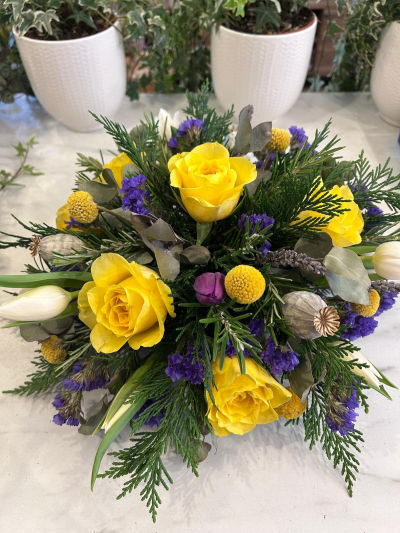 Seasonal Posy Arrangement - A seasonal posy arrangement, beautifully crafted with a vibrant mix of fresh flowers in bold and uplifting colours.