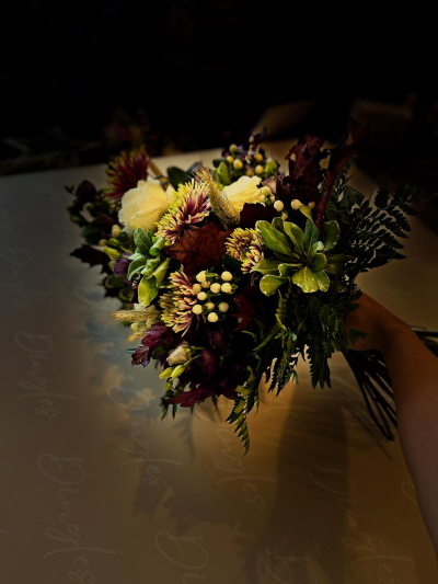 Autumnal Natural Tribute - A hand-tied funeral sheaf, designed in a rich, natural style using a seasonal selection of fresh flowers and foliage.

The warm, earthy tones and natural elements create a comforting and organic tribute, perfect for celebrating the life of a loved one with understated elegance. Expertly arranged and hand-tied, this sheaf is designed to be laid flat, making it a traditional choice for funeral services and graveside tributes.